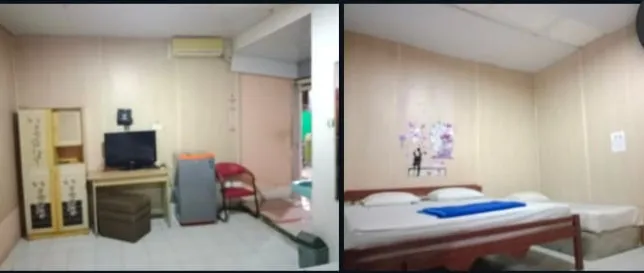 Kamar dengan TV, meja kerja, dan lemari pakaian